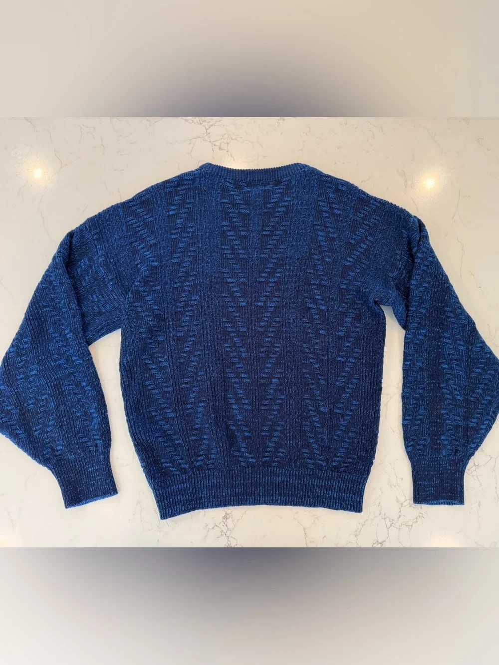 This vintage McGregor blue sweater is made of 100% acrylic
